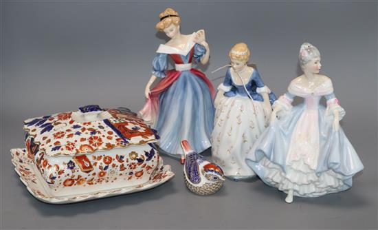 Three Royal Doulton porcelain figurines, a Crown Derby bird paperweight and a Victorian butter dish
